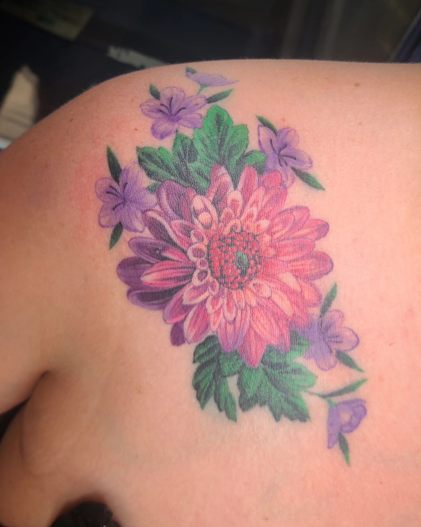 Flower bouquet new school tattoo on the shoulder by David Vodicka