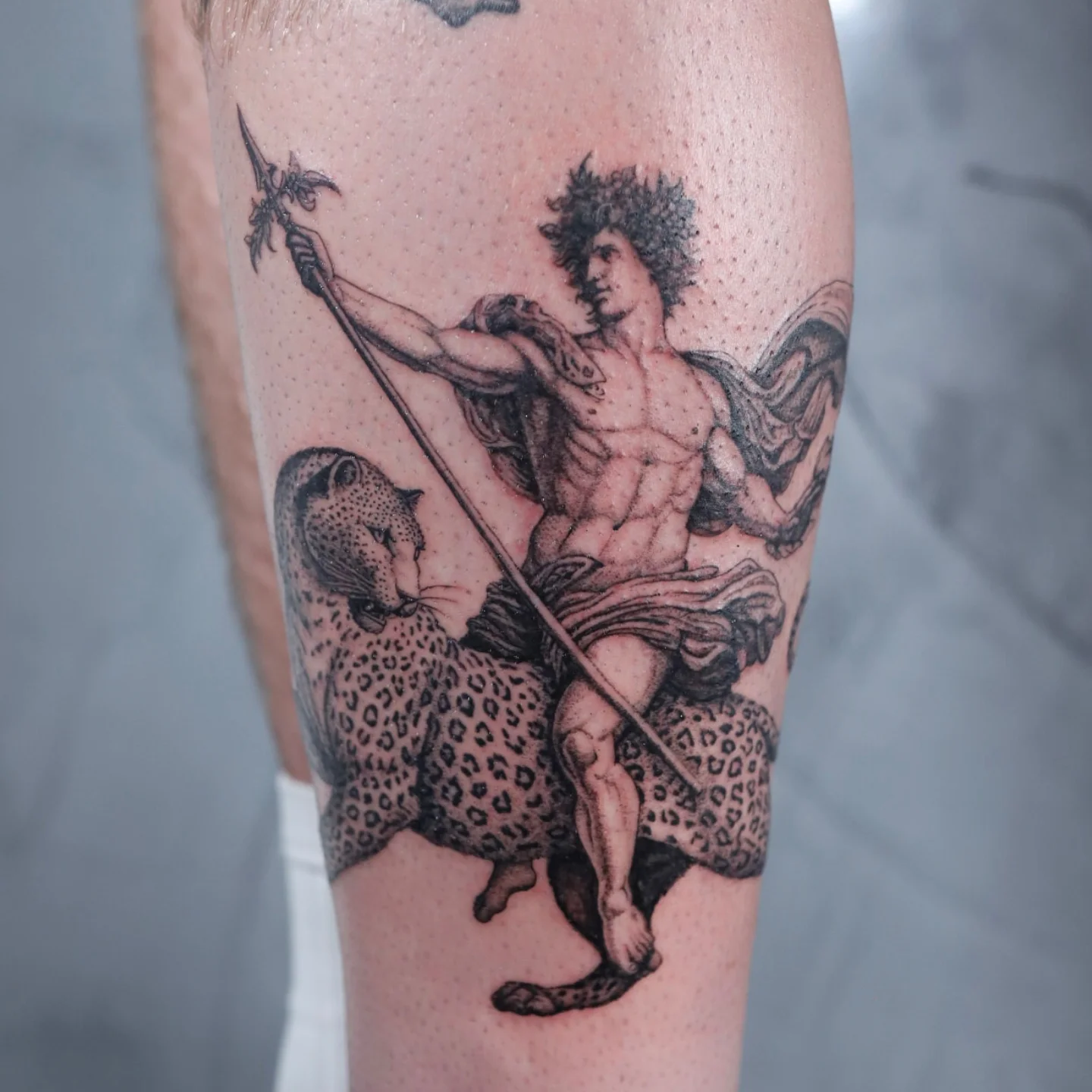 Centaur riding leopard dotwork tattoo on the calf by Jessica Sheahan