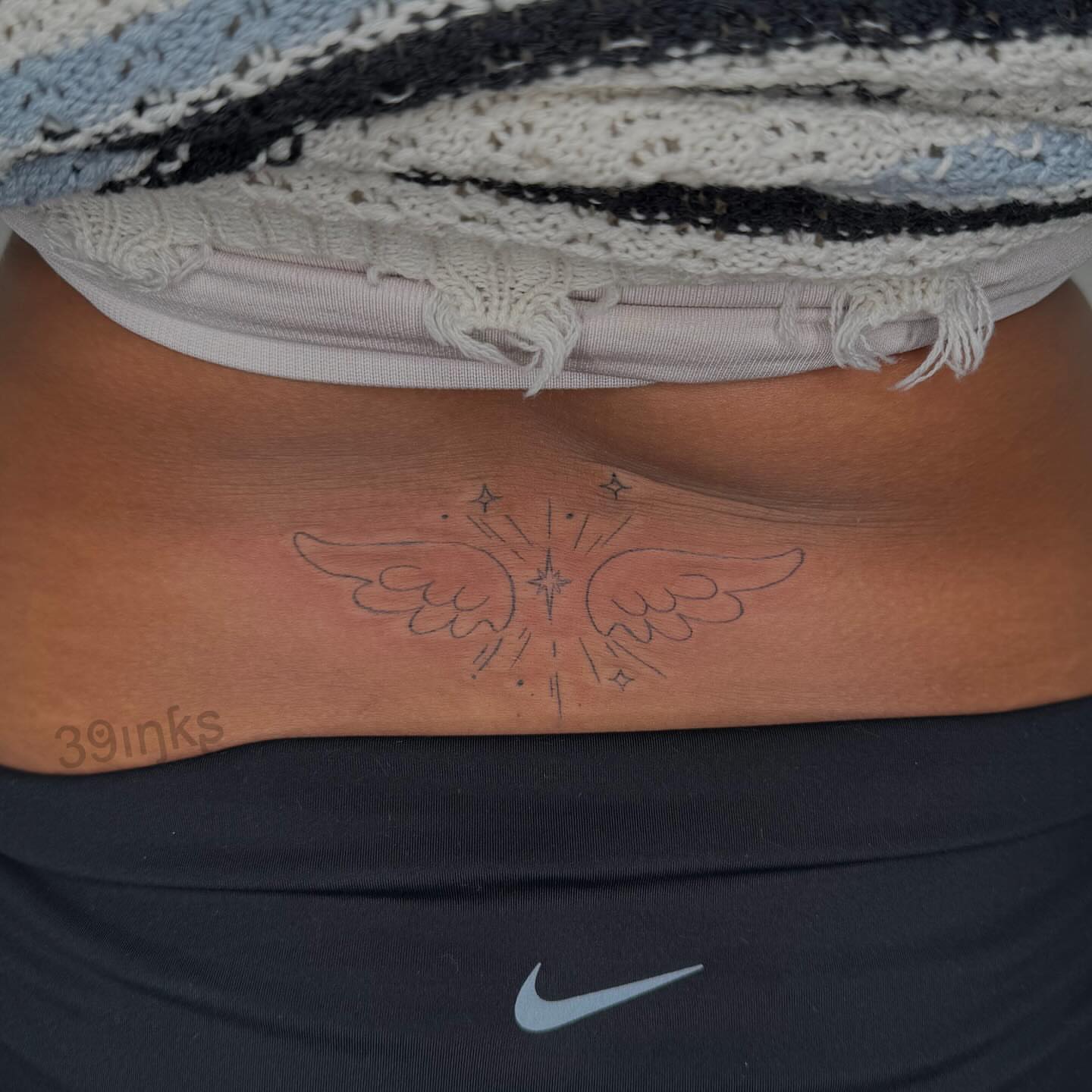 Wings geometric tattoo on the torso by Juliette :D