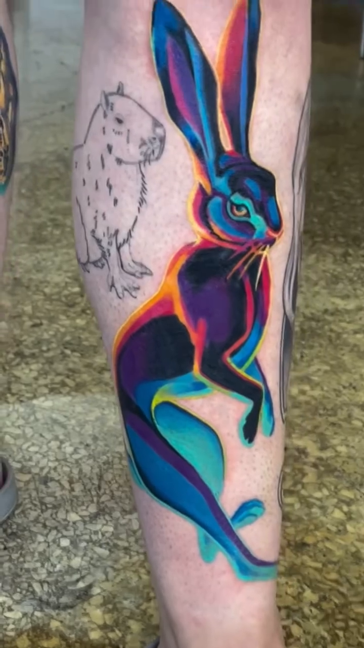 Rabbit and bird neo-traditional tattoo by Sienna Coppa