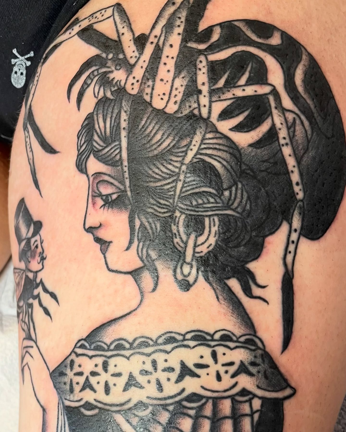 Woman with spider headdress American traditional tattoo on the shoulder by Cam TallBoy SLC Tattoo Artist, Salt Lake City, Utah