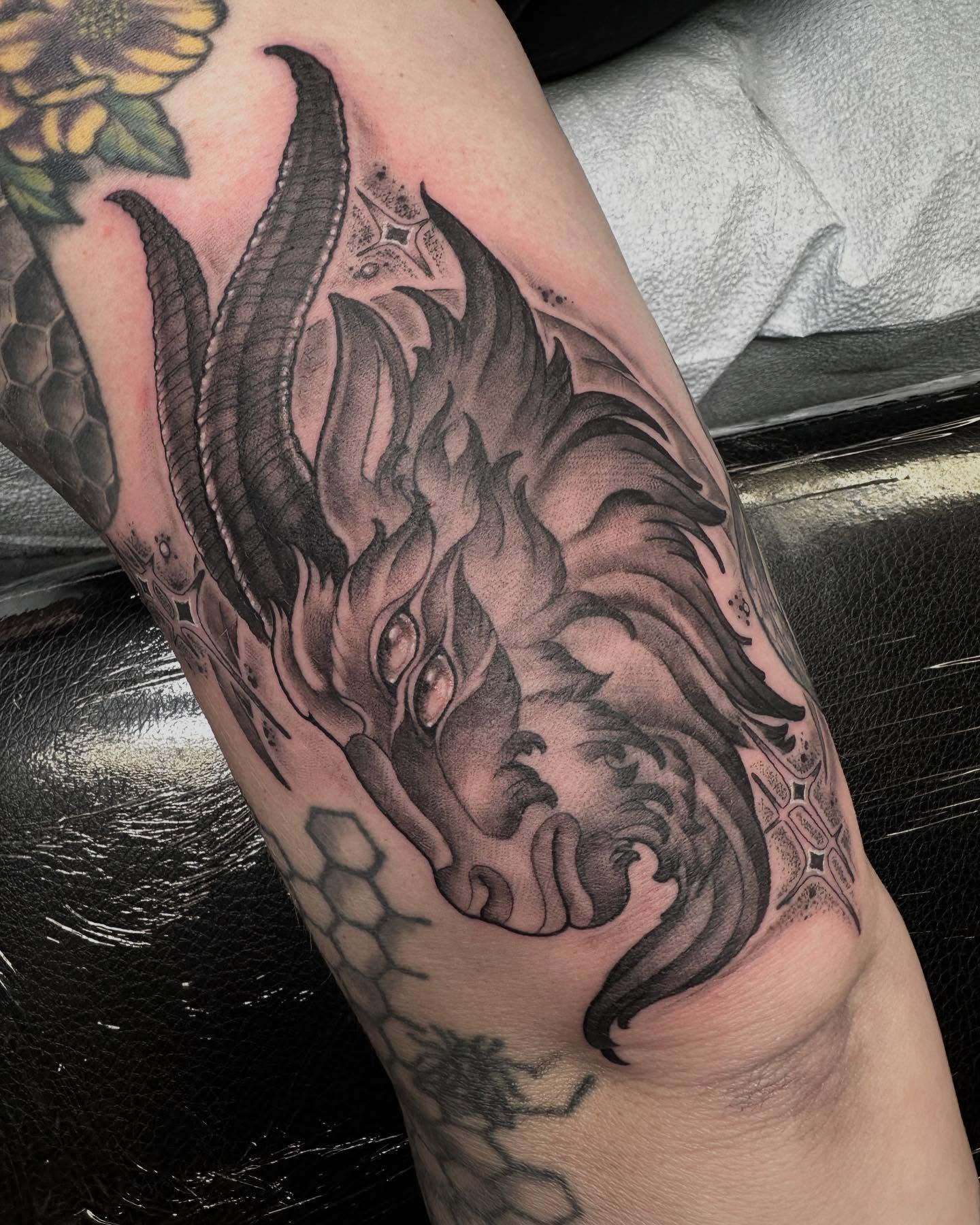 Dragon realism tattoo on the forearm by Michele Estes