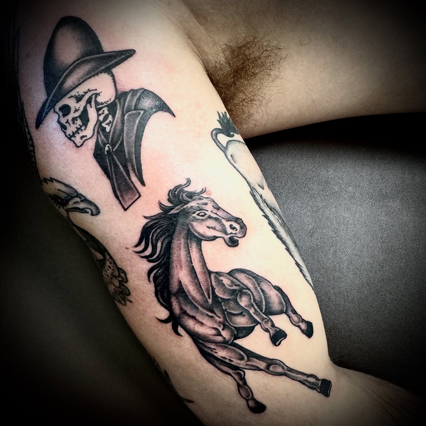 Horse and rider realism tattoo on the forearm by Kristen