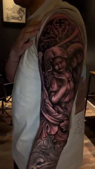 Tattoo by @tiffypxo — dark_realism, black_and_grey