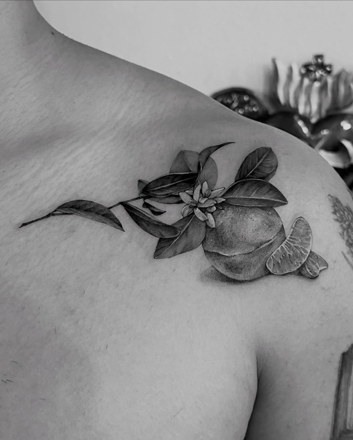 Flower and leaves black and grey tattoo on the shoulder by Soohee Jin✨ NYC tattoo artist