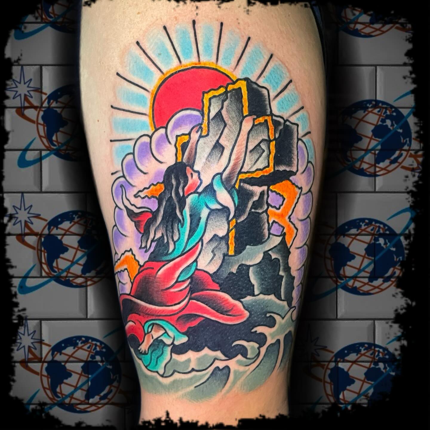 Woman climbing mountain American traditional tattoo on the thigh by Antonio DeCaro