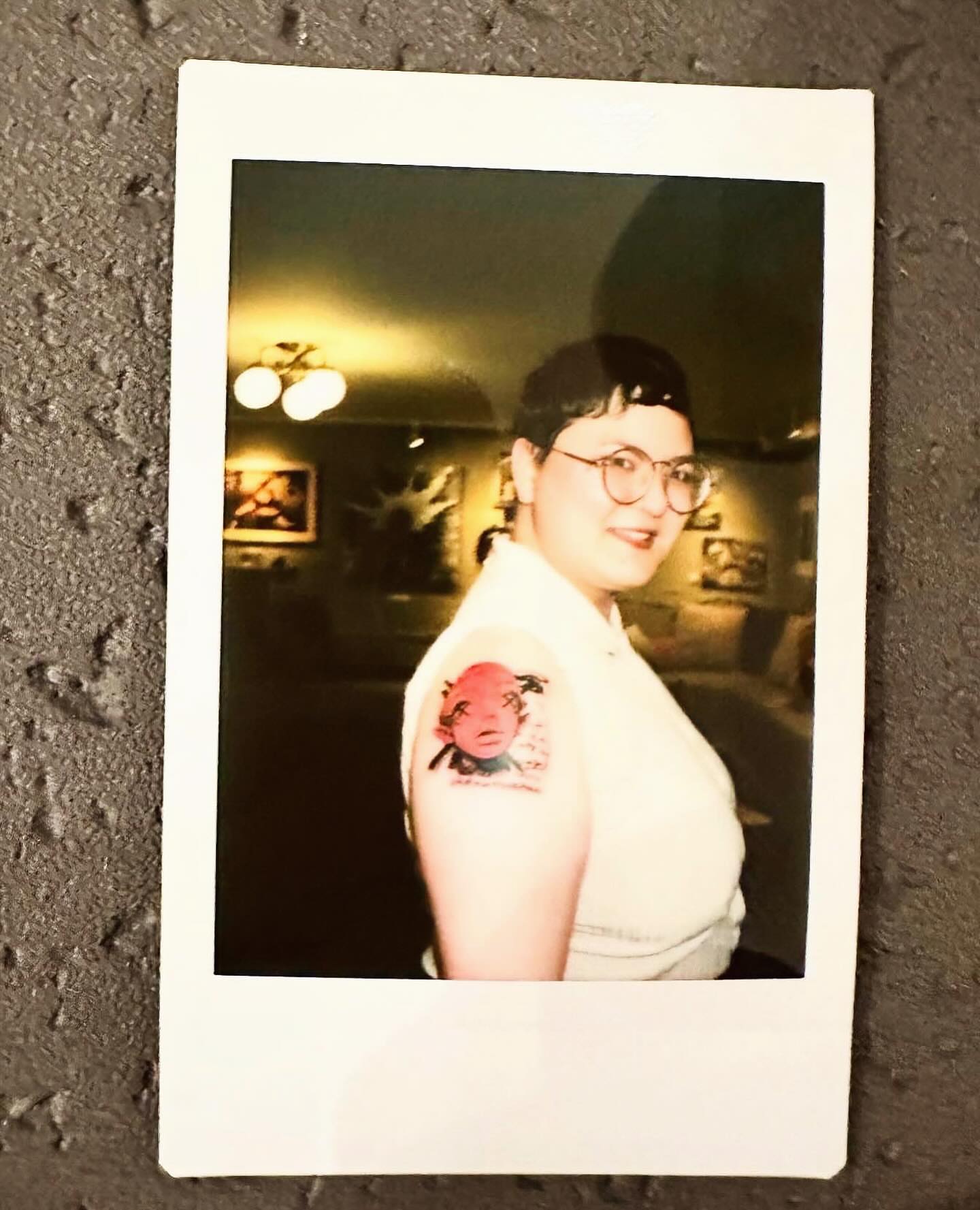 Red sun American traditional tattoo on the upper arm by Bennie Bae