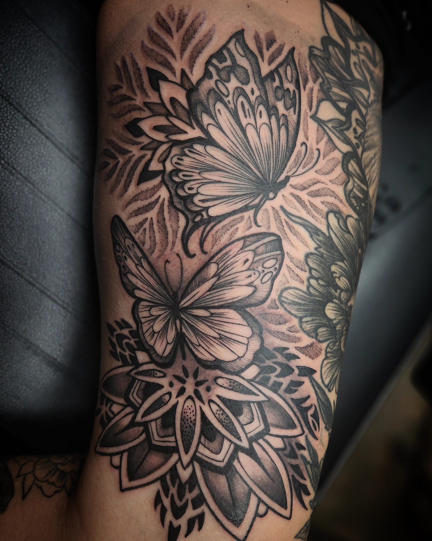 Butterflies and lotus geometric tattoo on the forearm by Jack Jr Mora