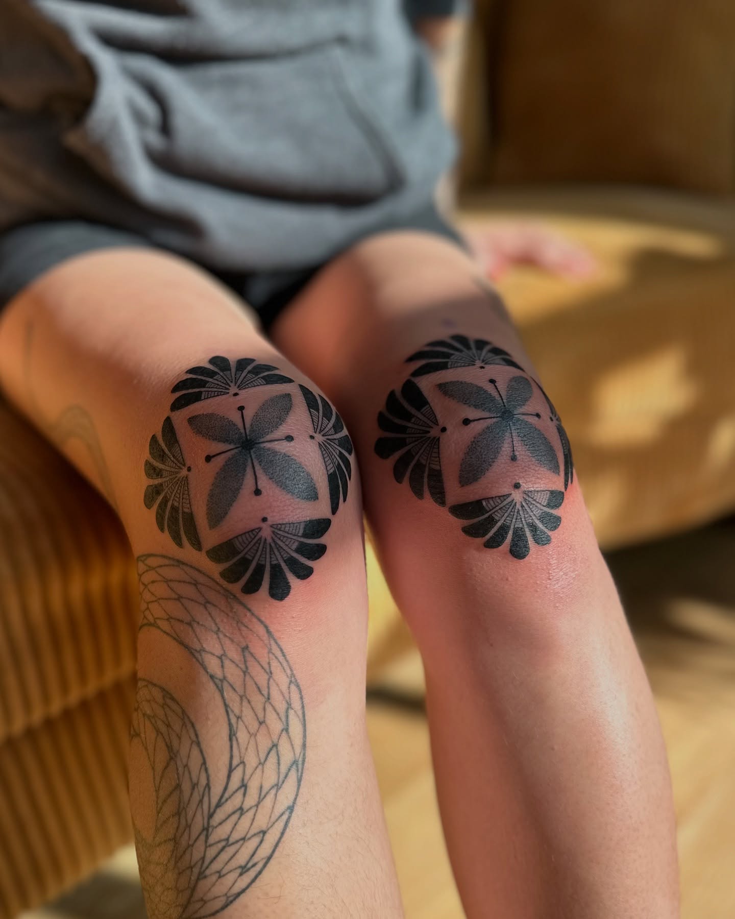 Geometric pattern geometric tattoo on the thigh by Alexandra Gray
