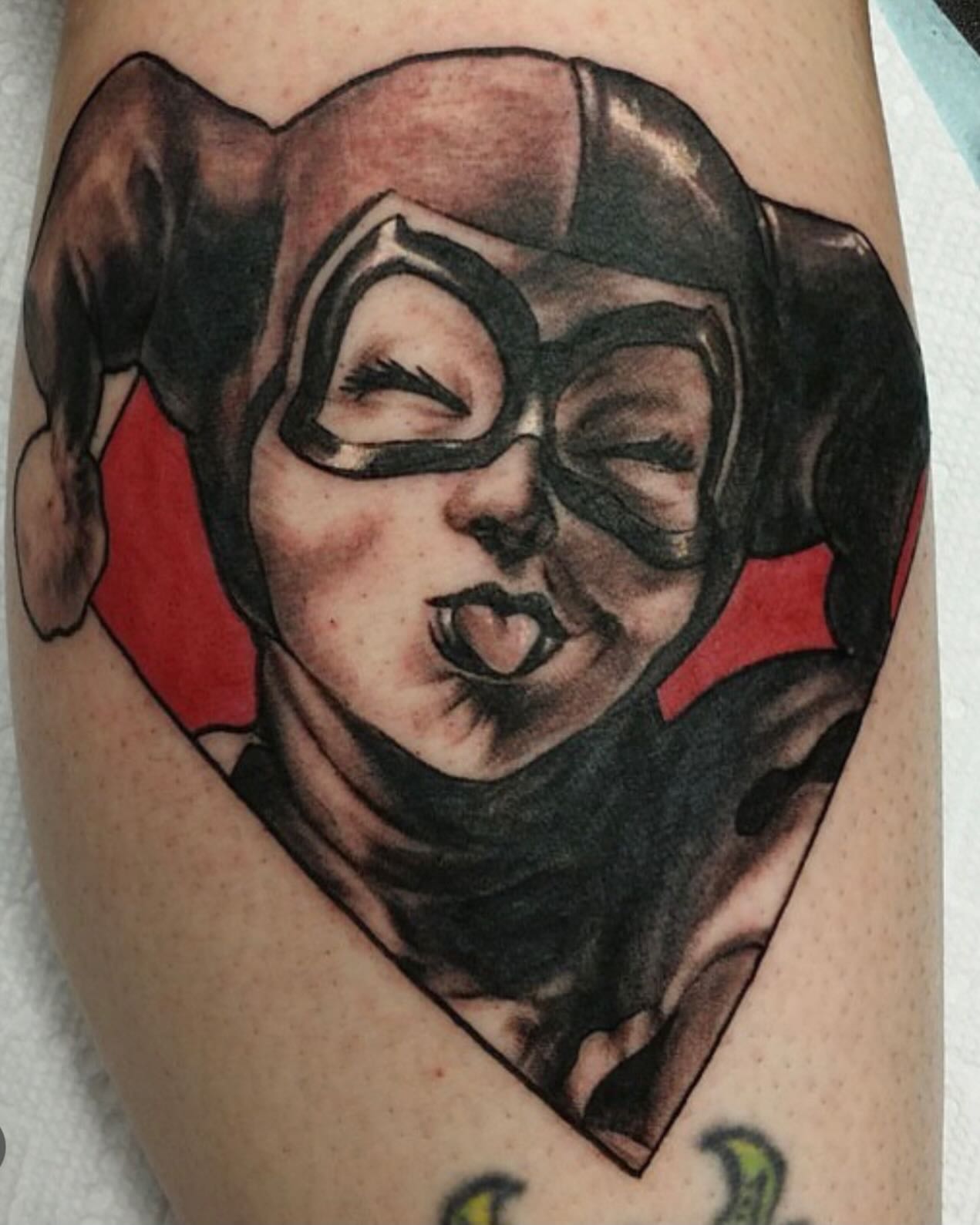 Joker character black and grey tattoo on the forearm by Levi Cox, Powell, Ohio