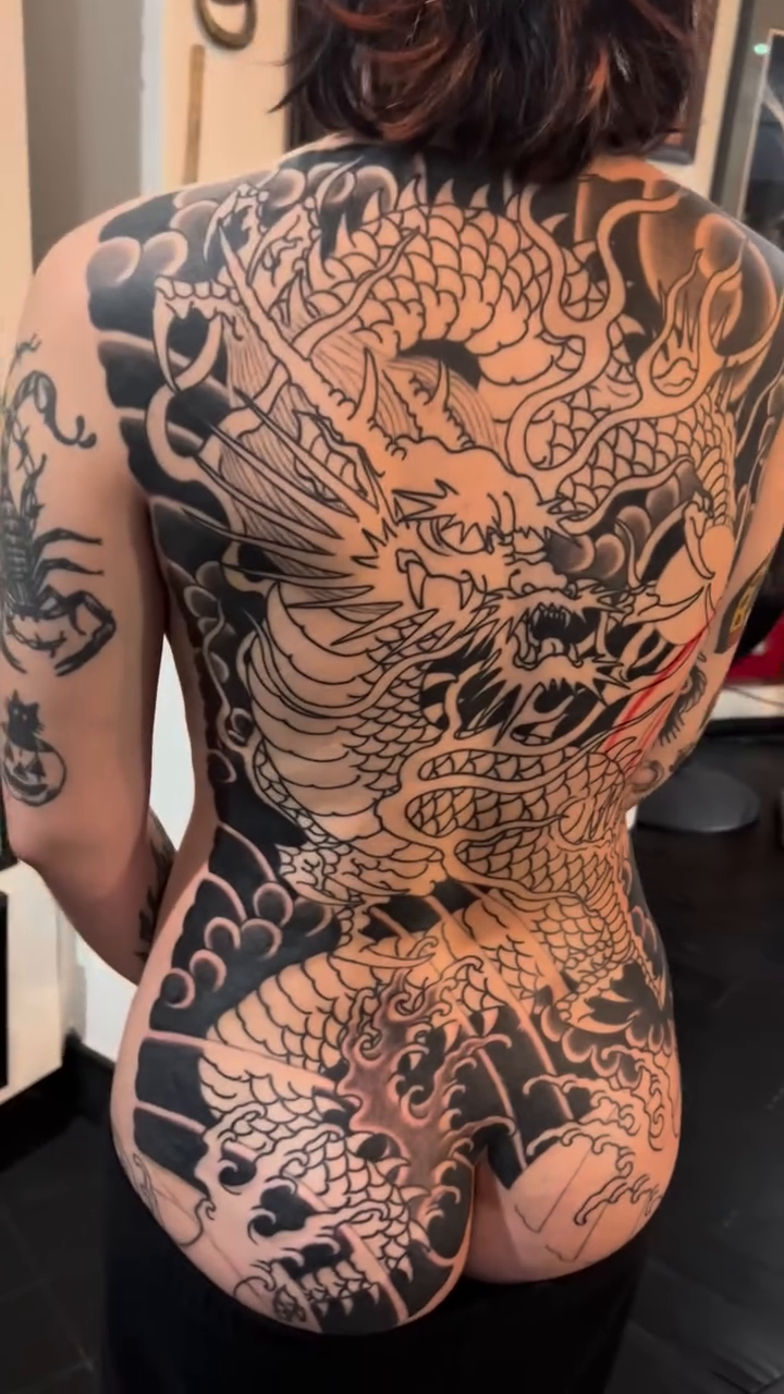 Dragon and waves japanese irezumi tattoo by Kayle Leogrande