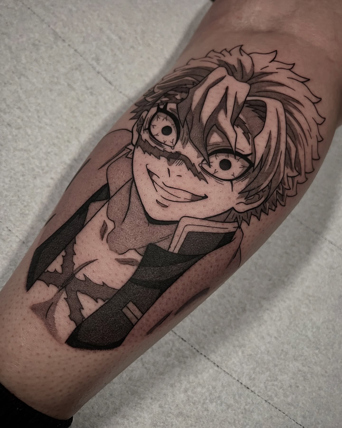 Anime character anime tattoo on the forearm by Chandler Roe