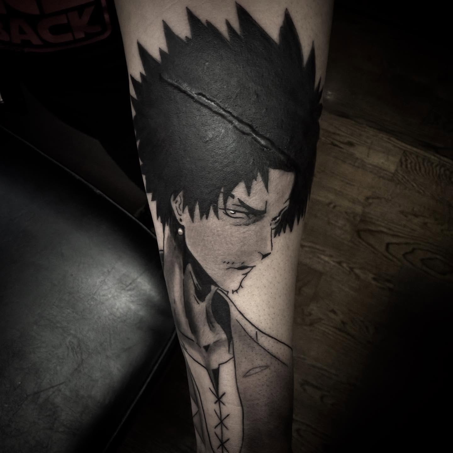 Anime character realism tattoo on the forearm by Jameson William Cowan