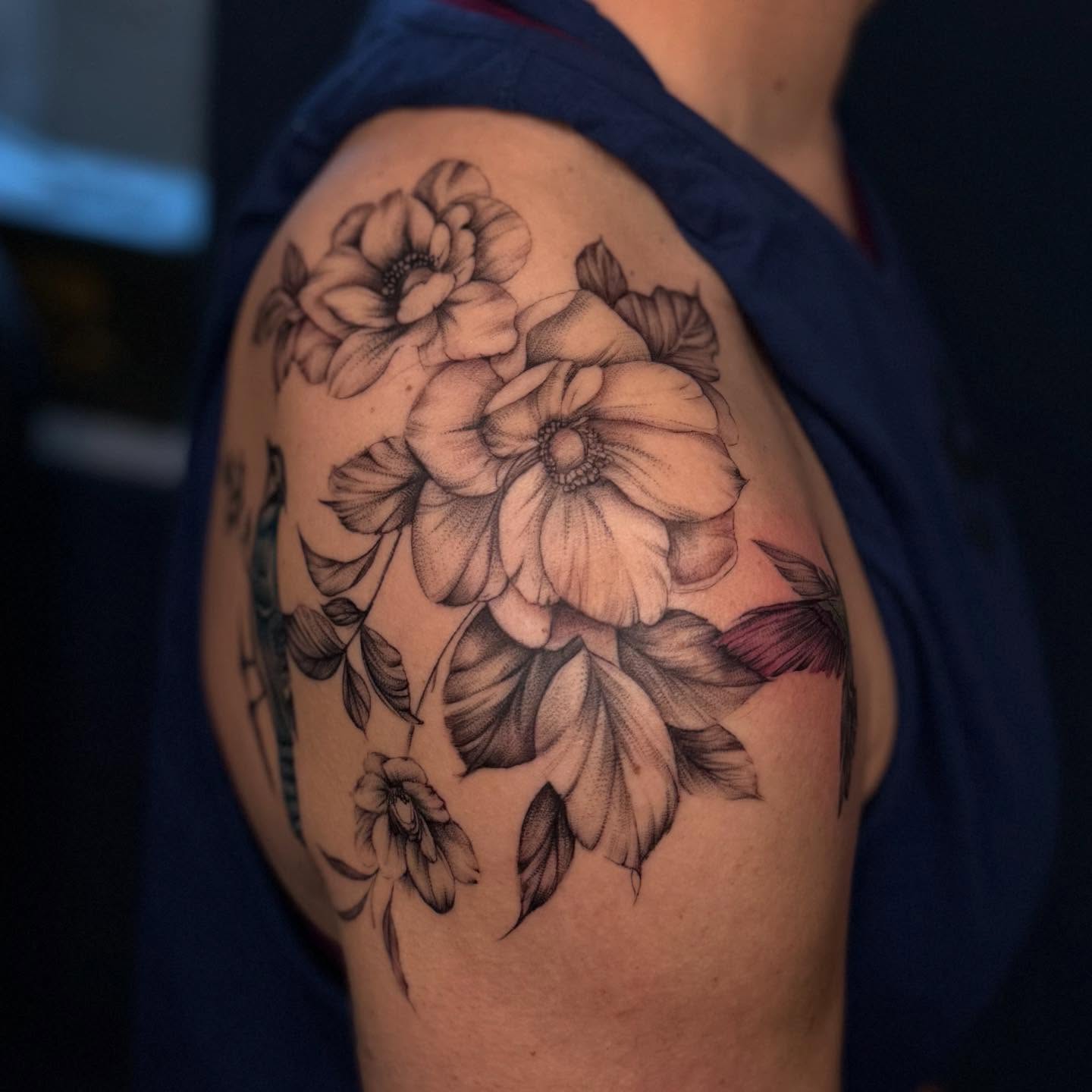 Floral bouquet black and grey tattoo on the shoulder by Jocelyn