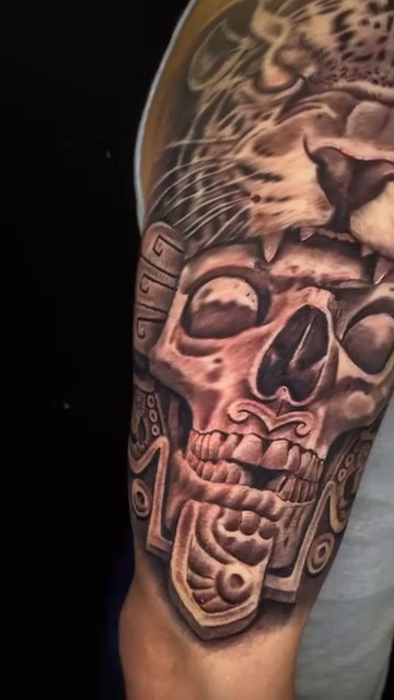 Jaguar and Aztec skull realism tattoo by Vic