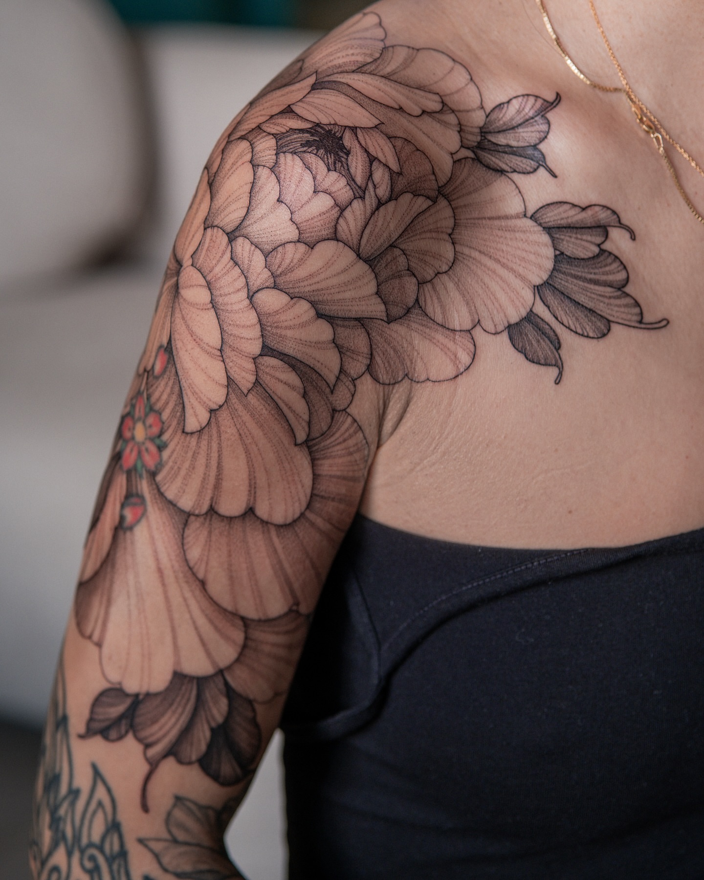 Peony black and grey tattoo on the shoulder by Flower Tattoo Sf