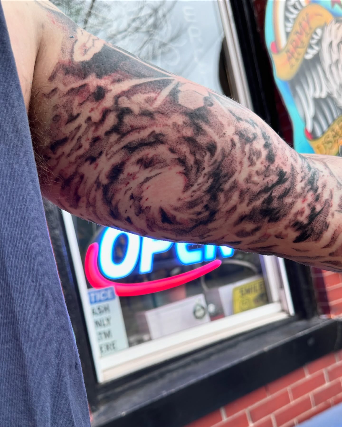 Abstract swirl black and grey tattoo on the forearm by Shannon, Cincinnati, Ohio