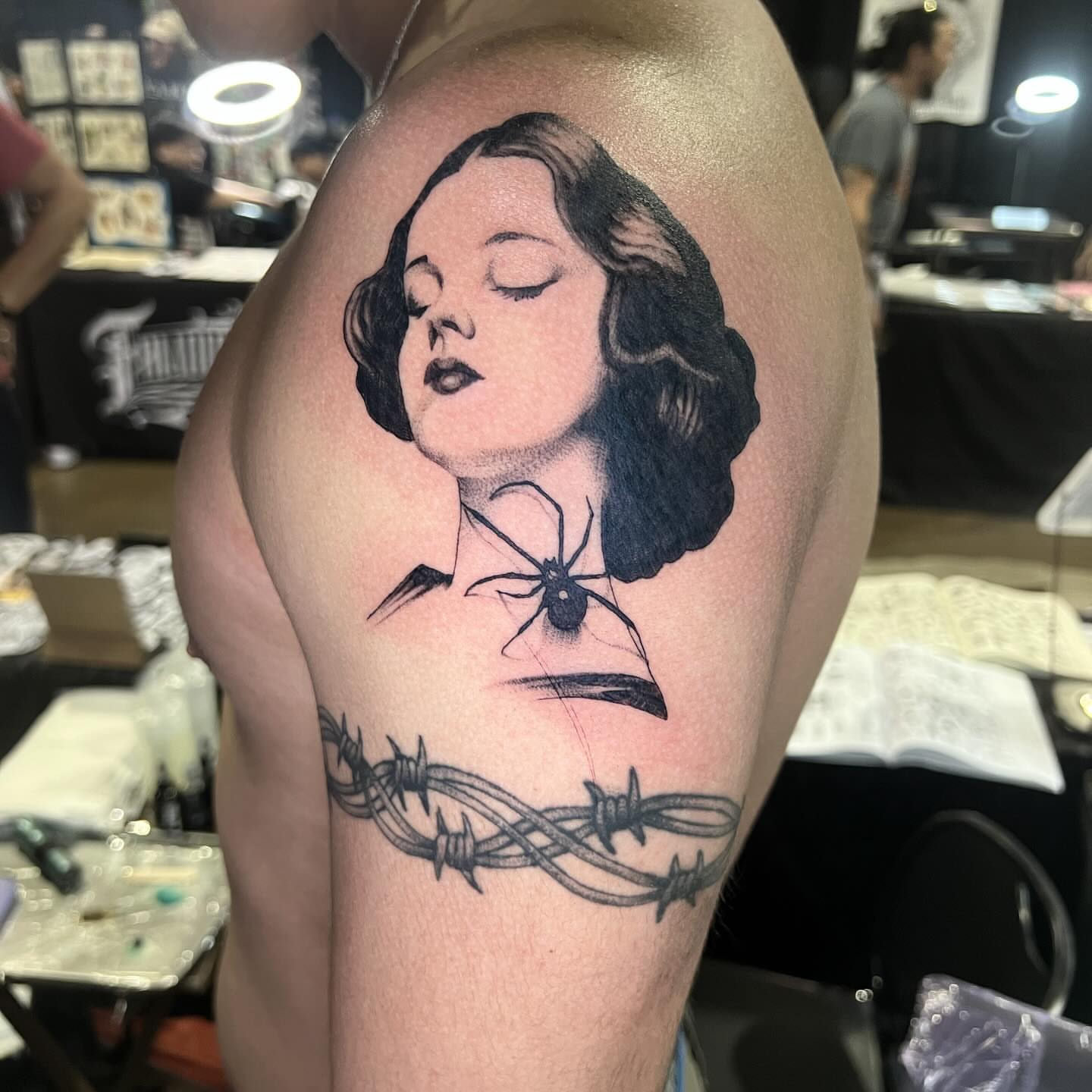 Woman with spider realism tattoo on the shoulder by Prncjordn, Stallings, North Carolina