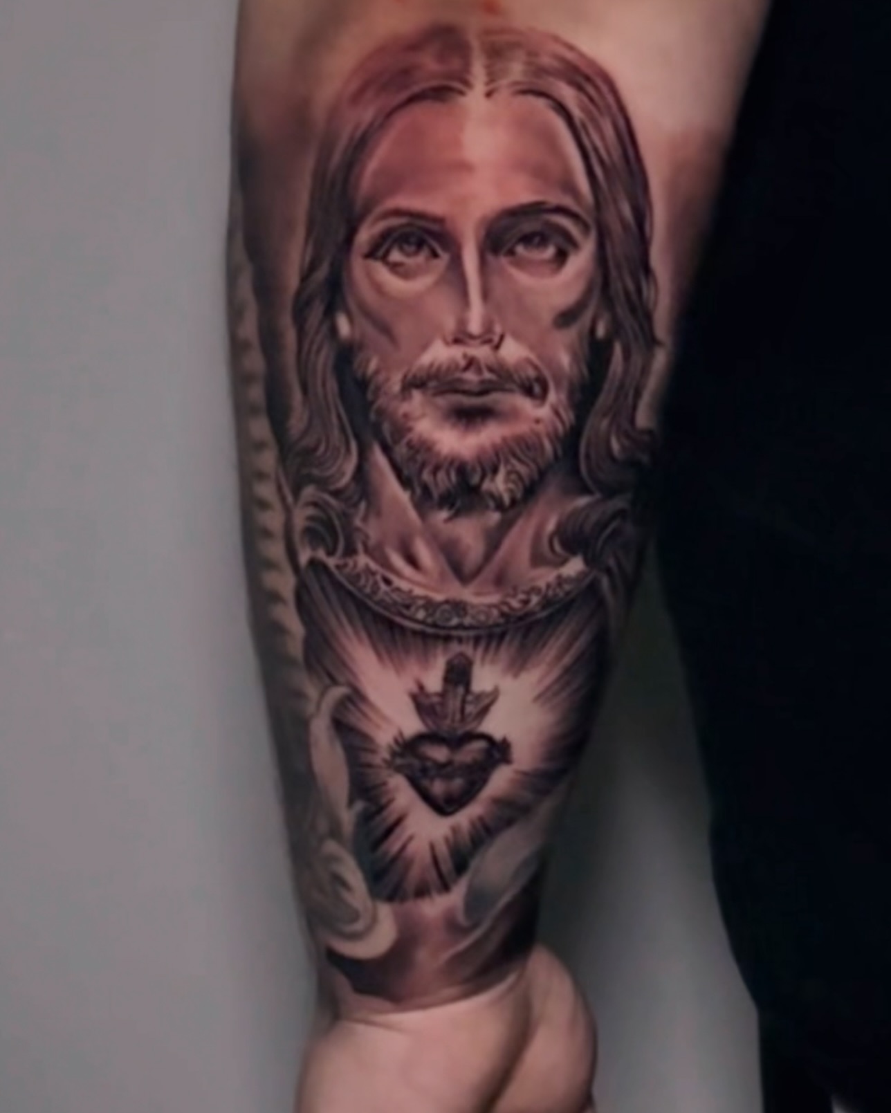 Religious figure realism tattoo on the forearm by Erick @ AZTEC_TATT