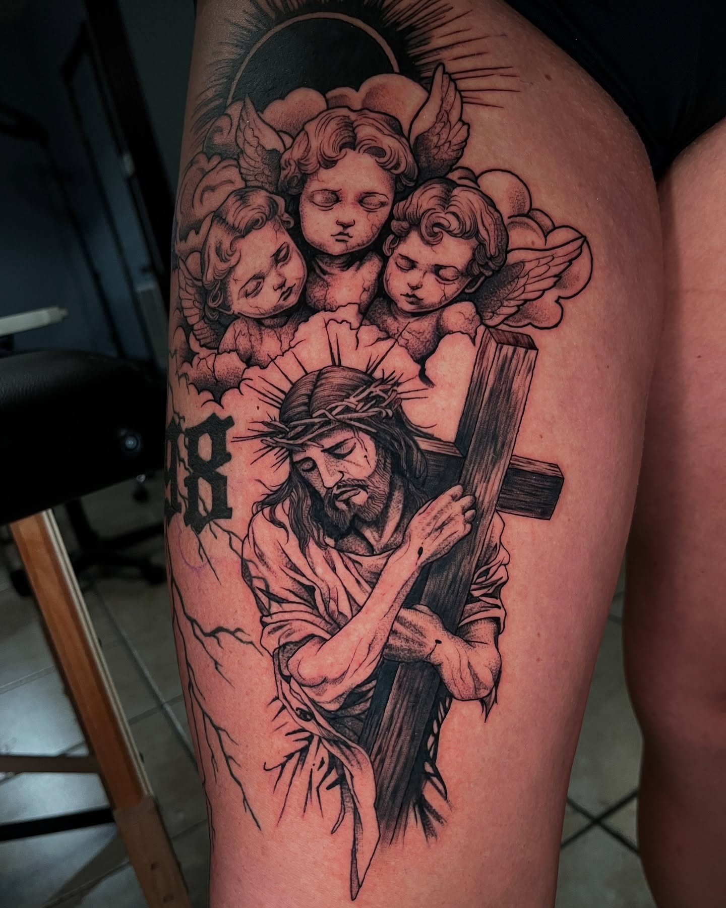 Jesus carrying cross realism tattoo on the thigh by Angie Morales, Laredo, Texas