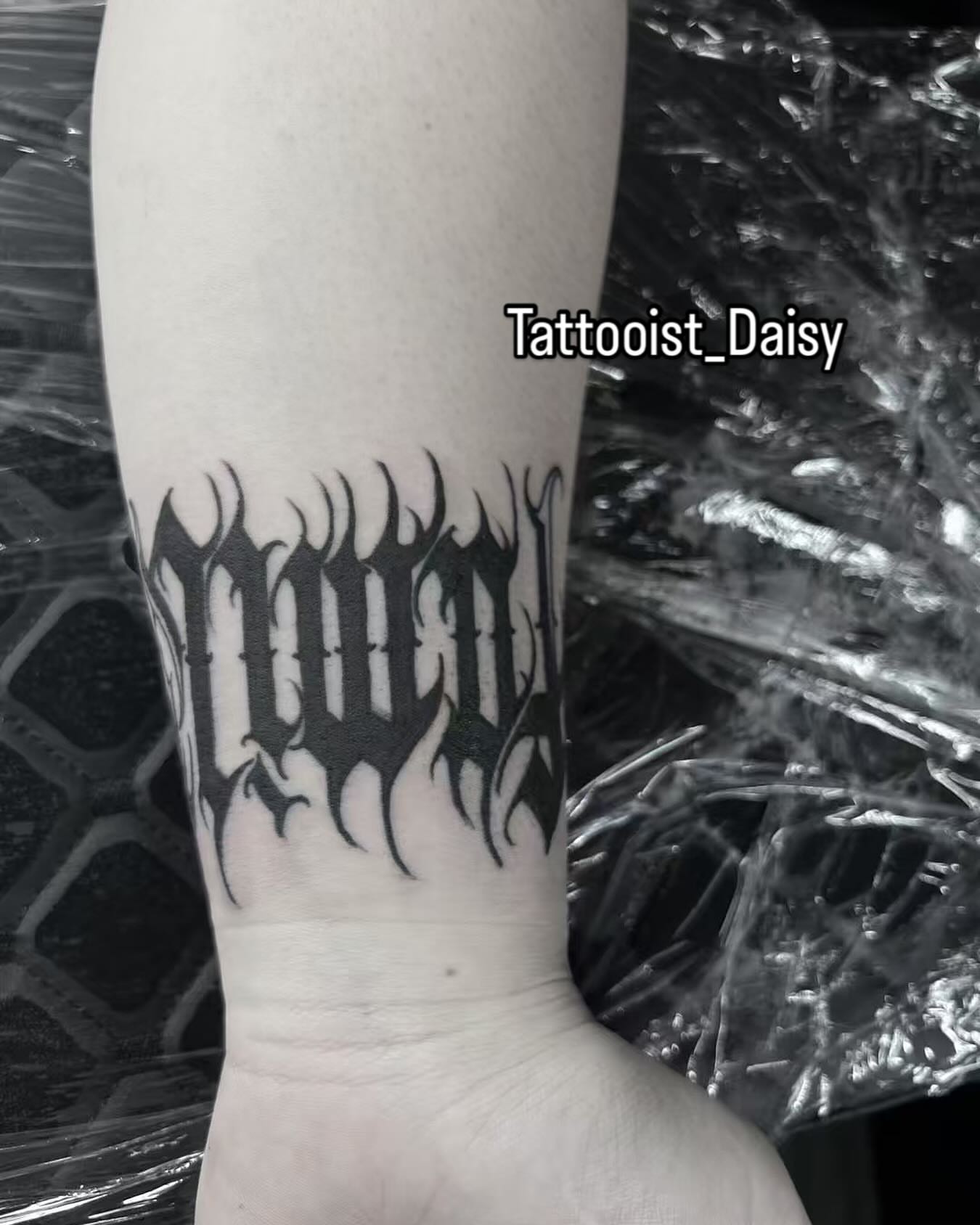 Gothic lettering lettering script tattoo on the forearm by Ink _daisy_