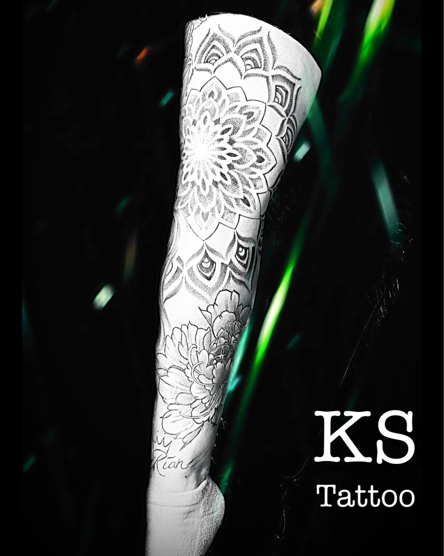 Floral mandala dotwork tattoo on the forearm by Karen Smith