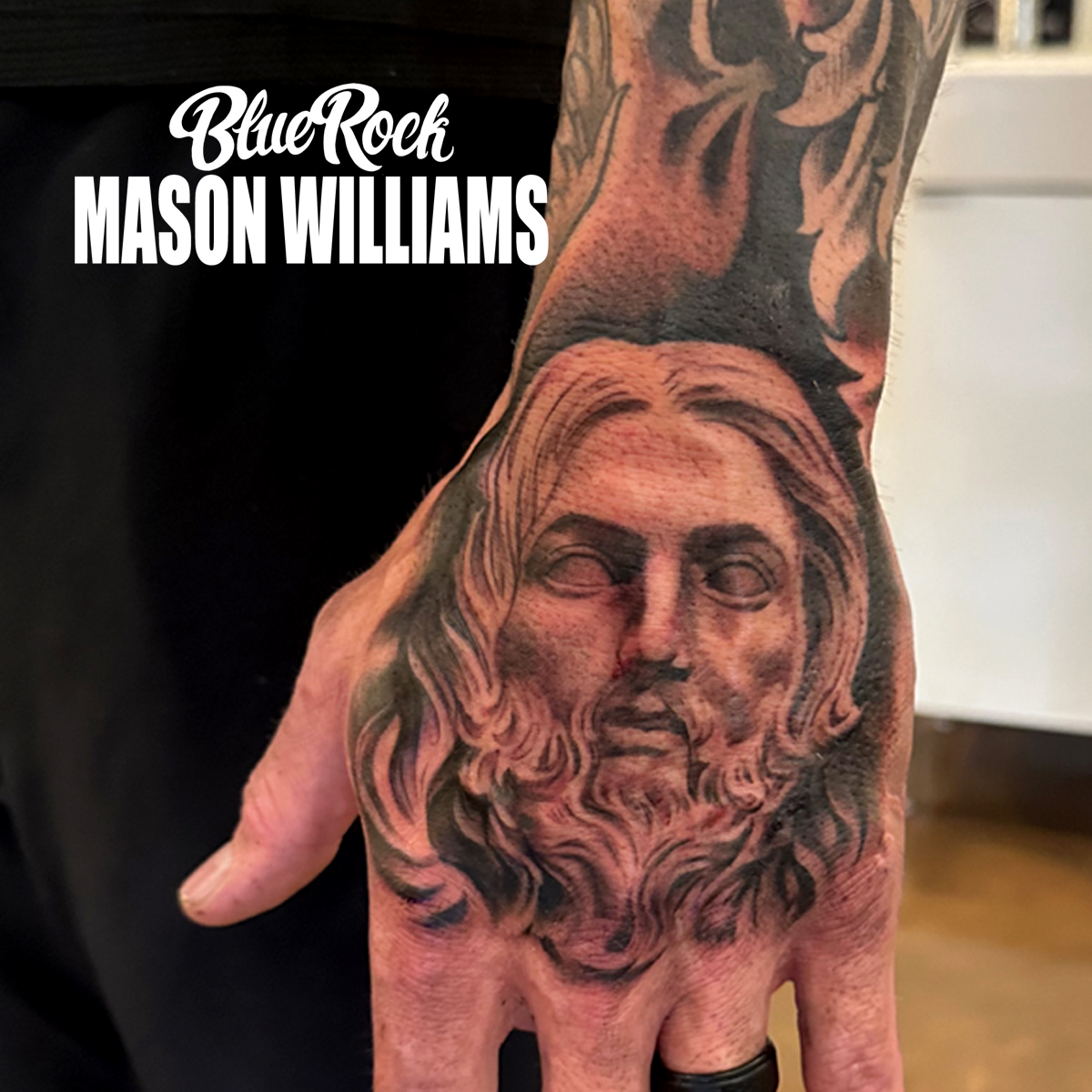 Religious figure realism tattoo on the hand by Mason Williams