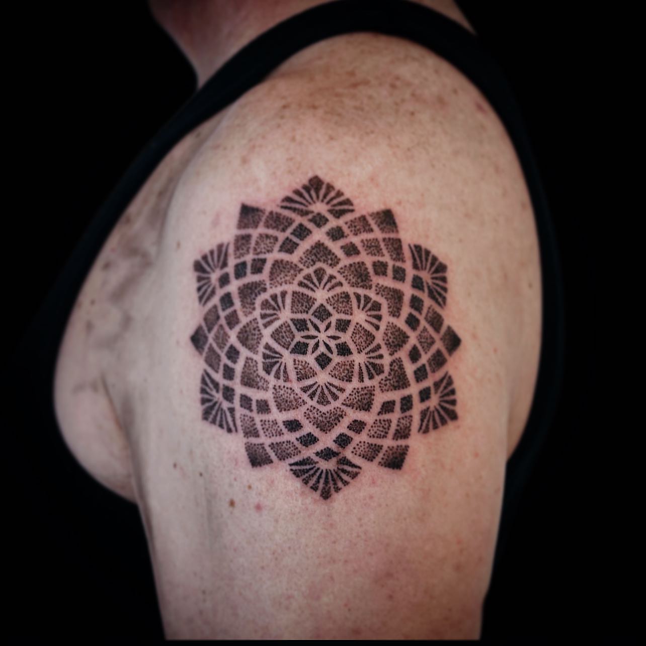 Geometric pattern dotwork tattoo on the shoulder by โงโ โฑ โพ ๐ณ๐๐๐๐๐ โฆ โฑ โโง