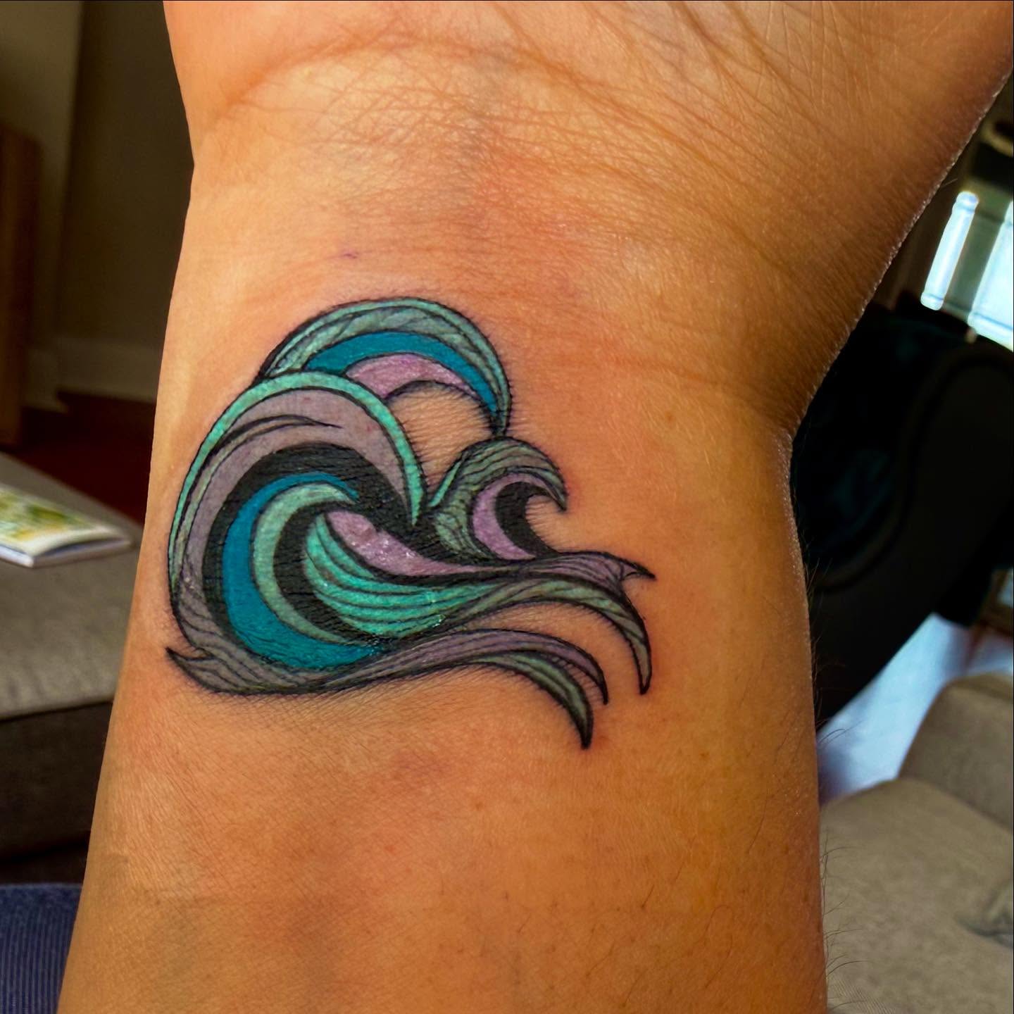 Wave new school tattoo on the forearm by Tiffany