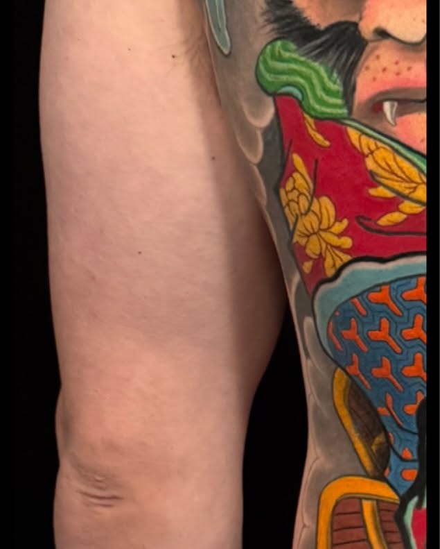 Face American traditional tattoo on the forearm by Las Vegas Japanese Tattoo Artist, Las Vegas, Nevada