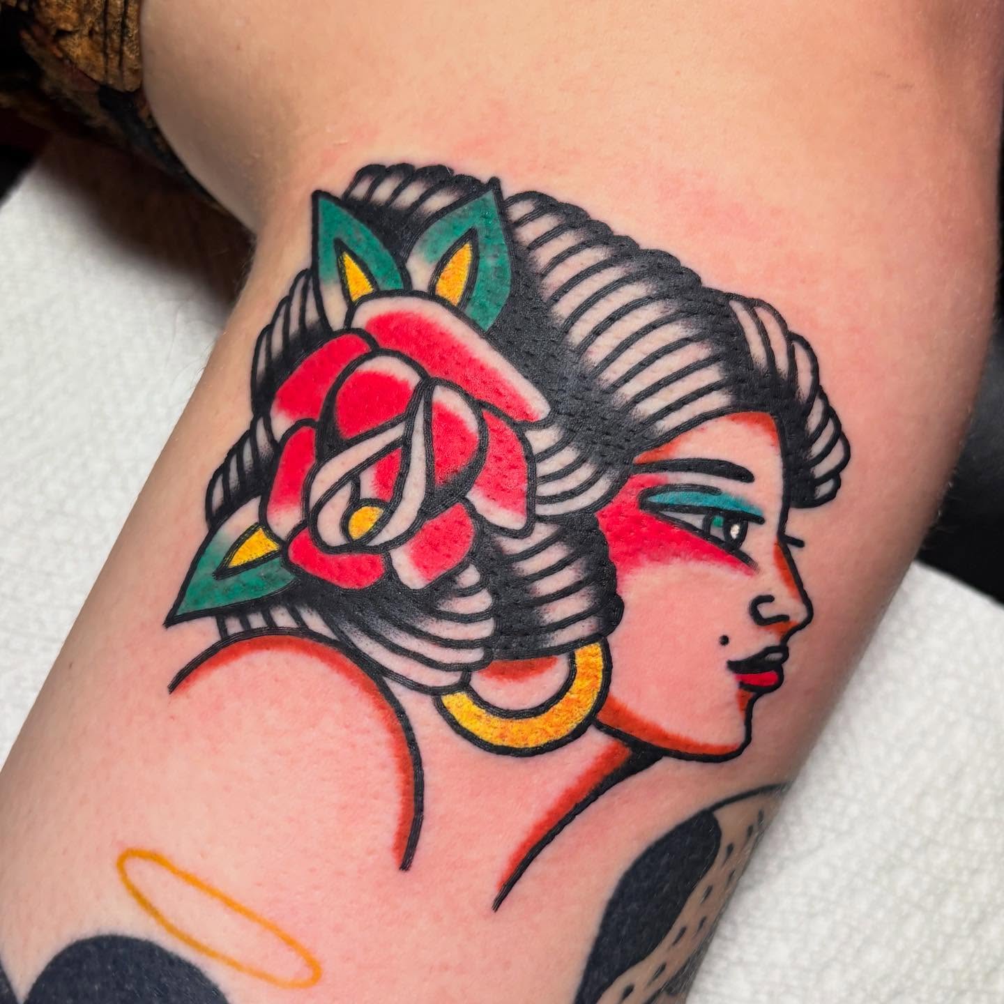 Geisha profile American traditional tattoo on the forearm by Mr. Brent