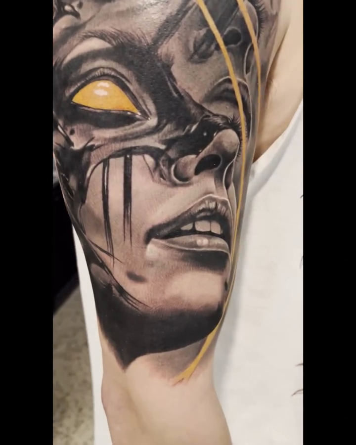 Multi-eyed face with abstract elements realism tattoo by Krys King Tattoos