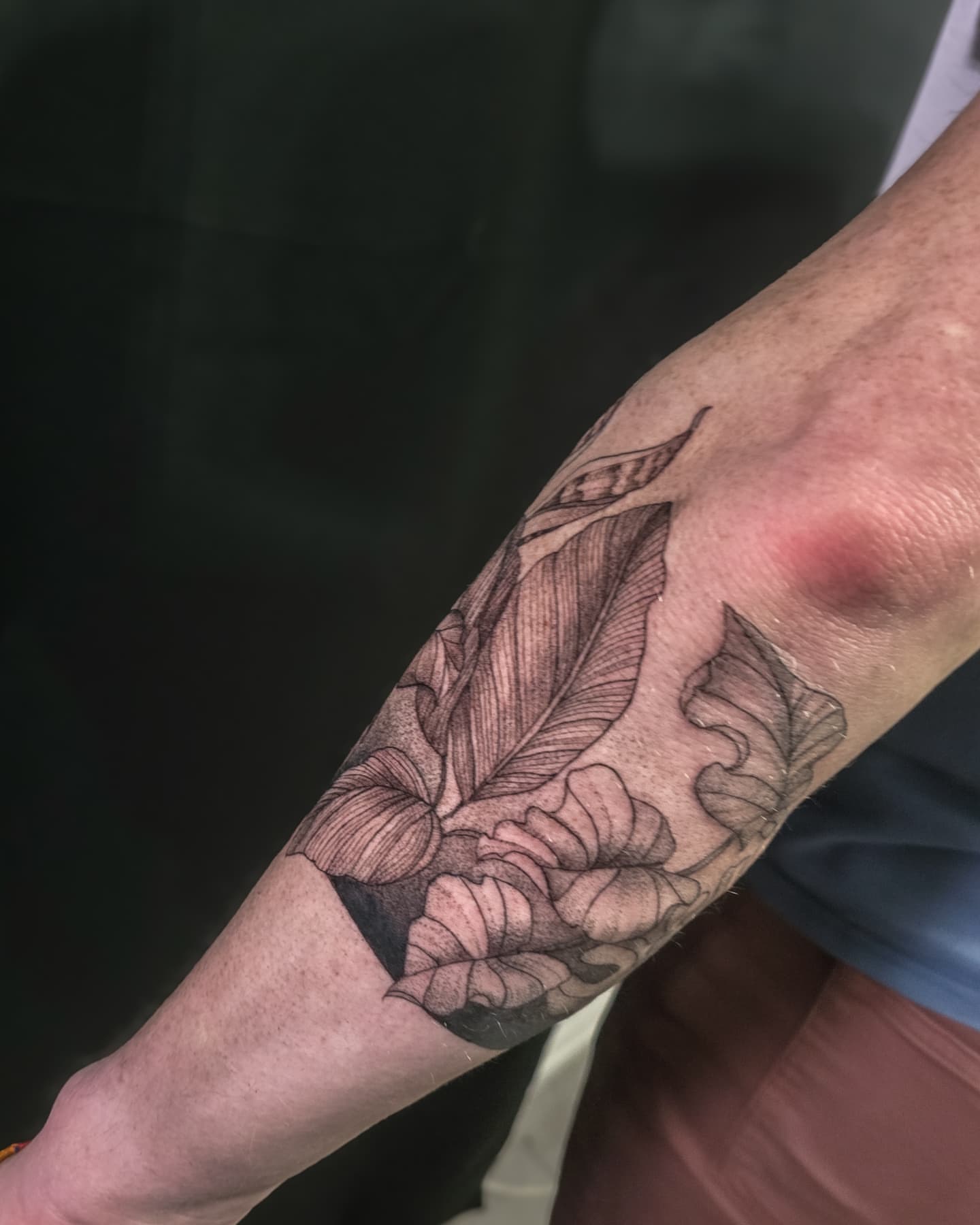 Floral arrangement black and grey tattoo on the forearm by Utah Tattoo Artist