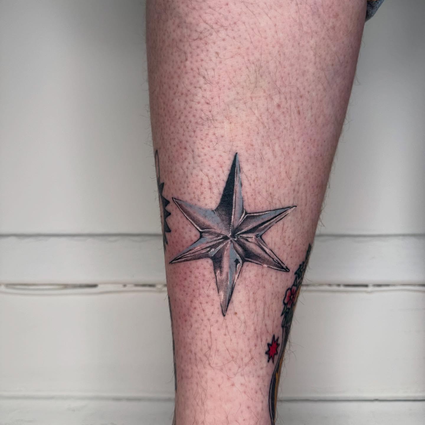 Star geometric tattoo on the calf by 🗡Addie Kat🗡