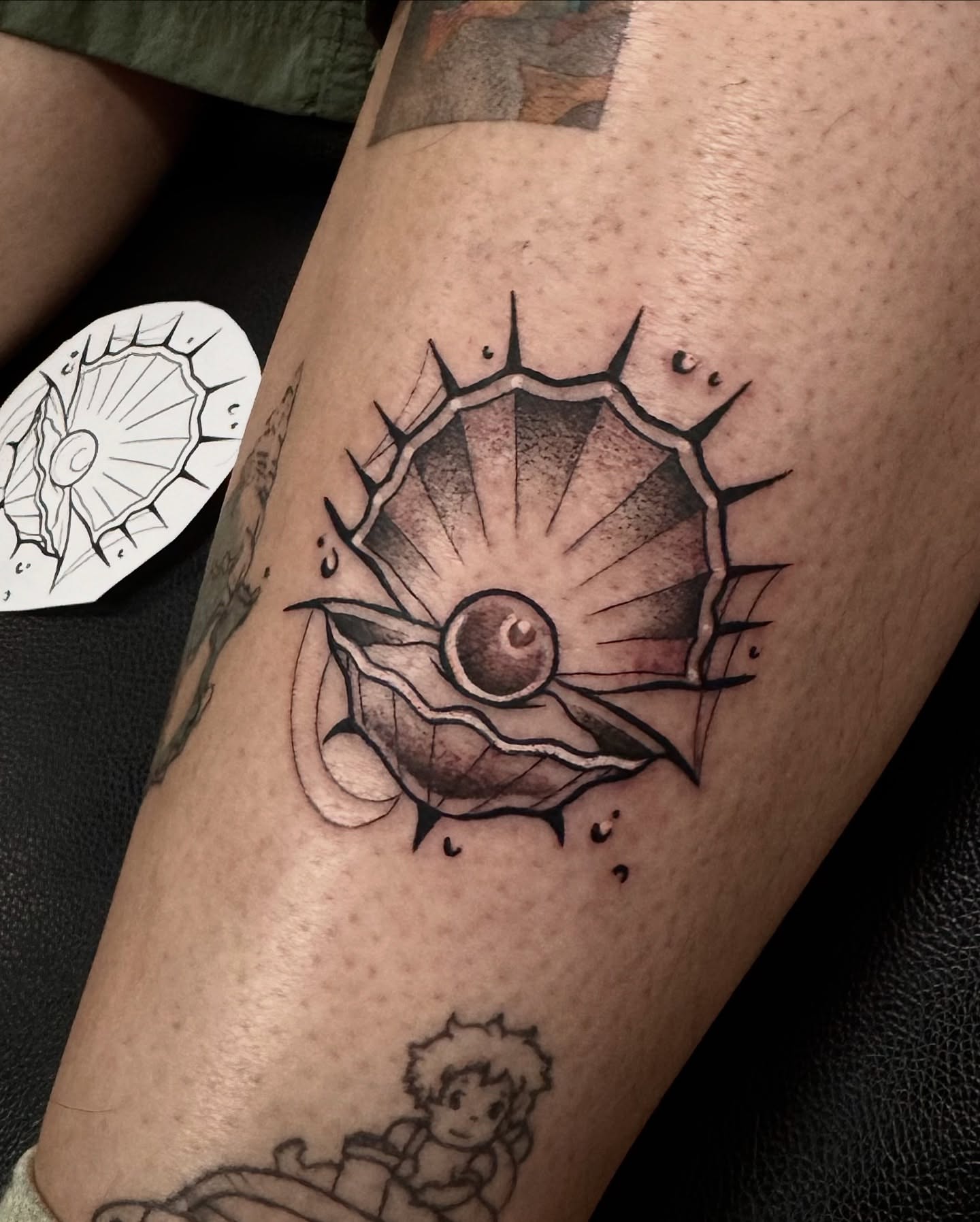 Eye and sun black and grey tattoo on the forearm by Mags🗡️