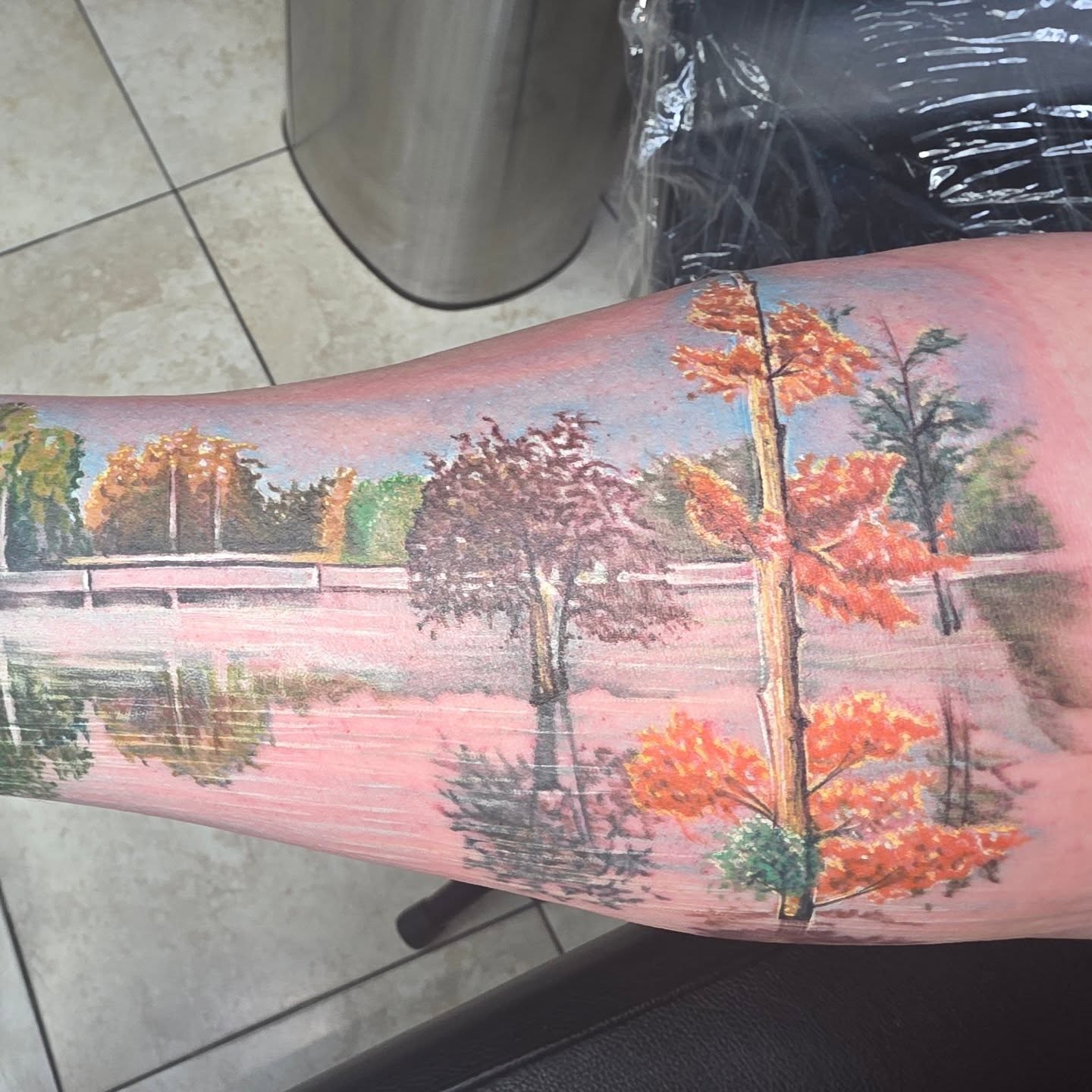 Autumn landscape realism tattoo on the forearm by 𝐍𝐄𝐗'𝐒 𝐈𝐍𝐊 🇨🇺, Tampa