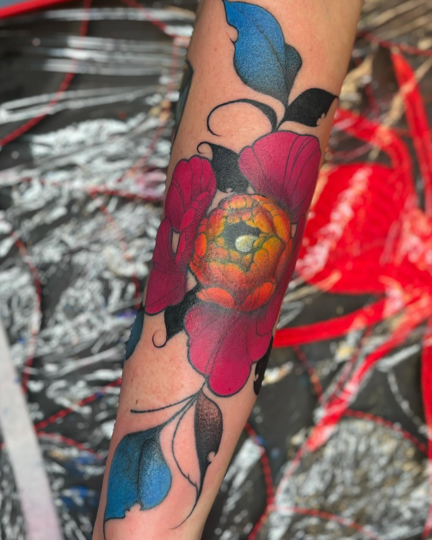 Peony flower new school tattoo on the forearm by orlando