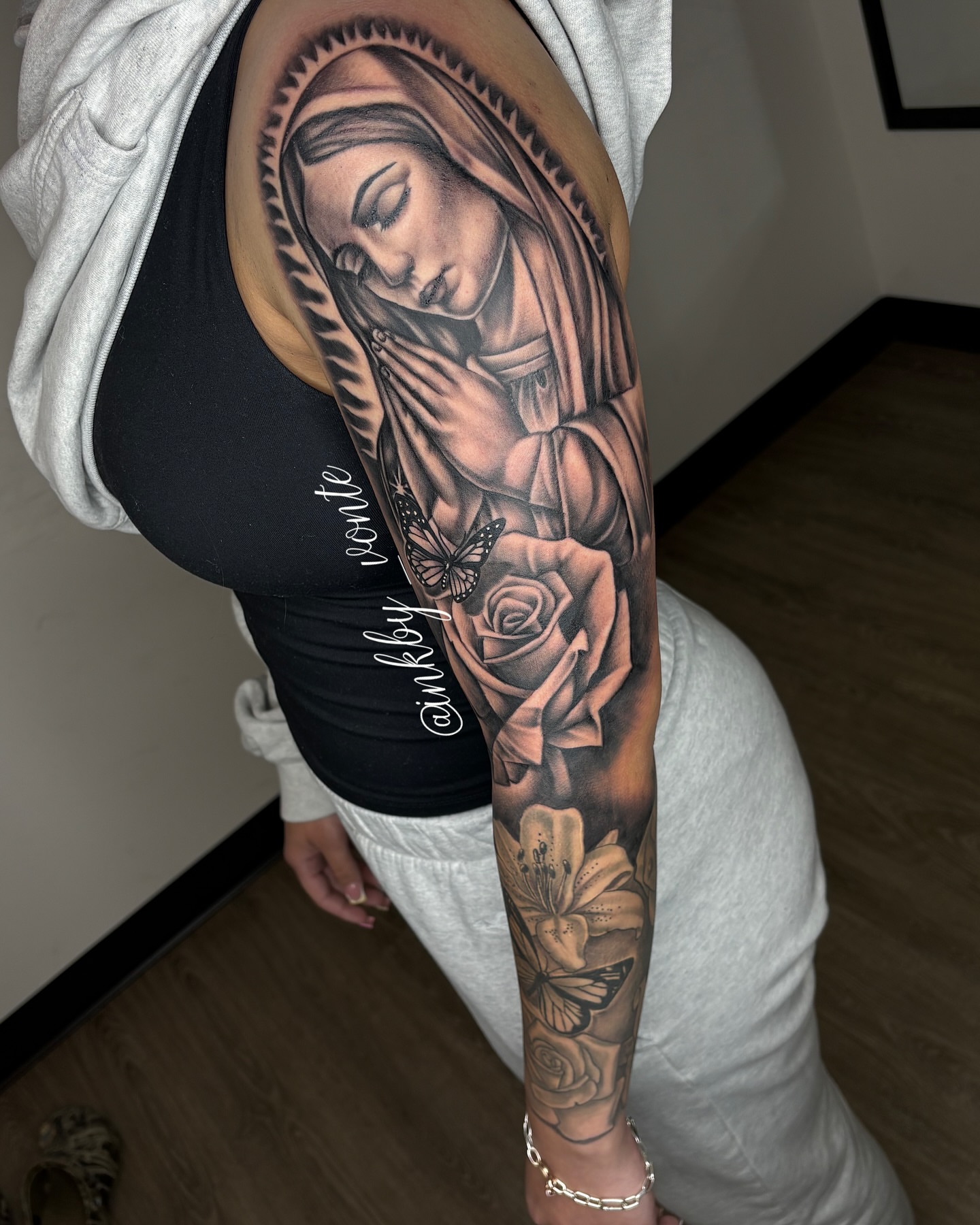 Praying woman realism tattoo on the forearm by Vonte Seay