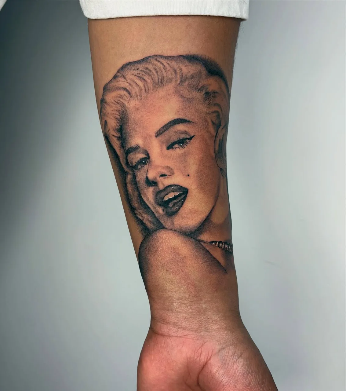 Woman's face realism tattoo on the forearm by Savana ☆