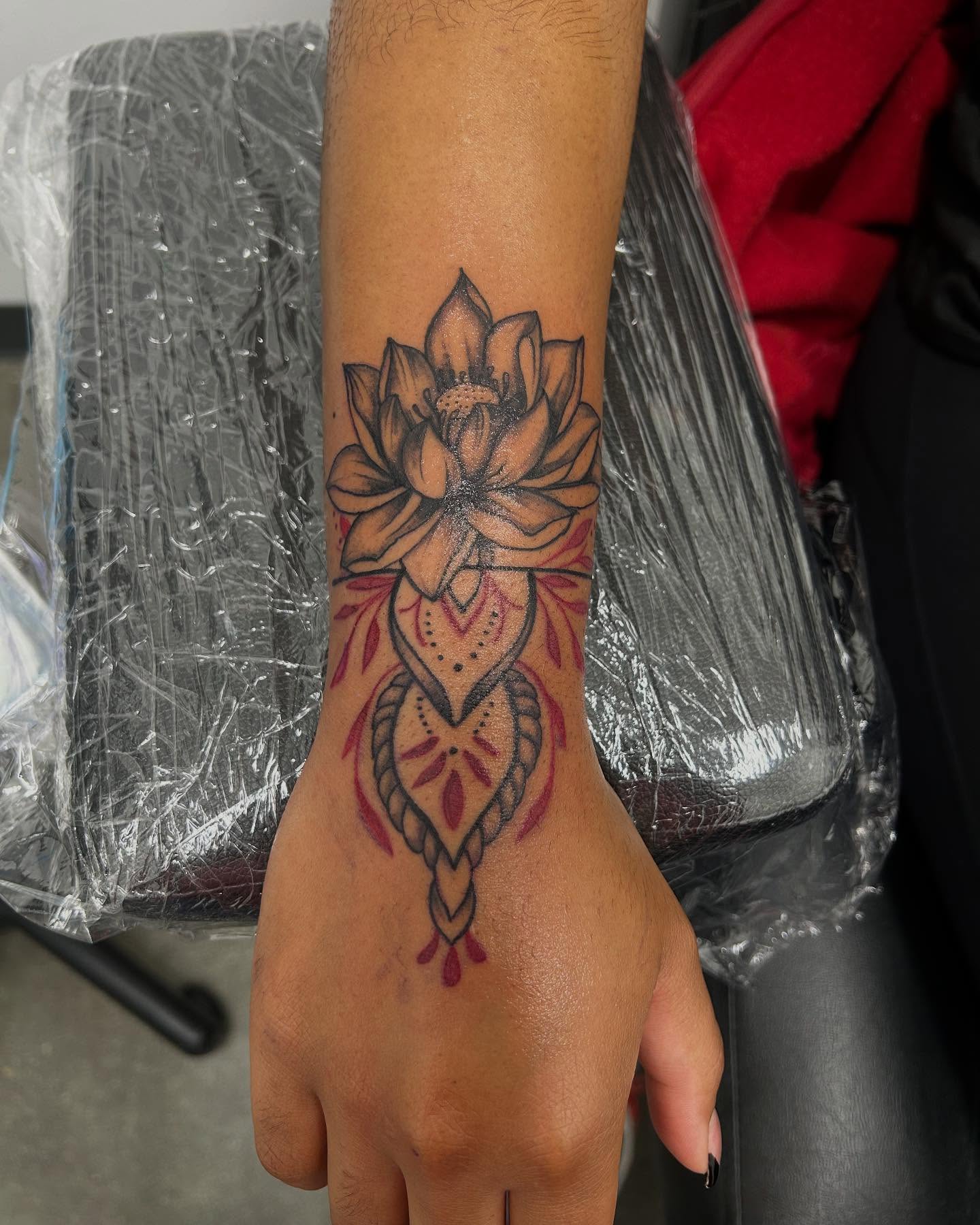 Lotus flower dotwork tattoo on the forearm by Stephania ATLANTA TATTOO ARTIST🎨