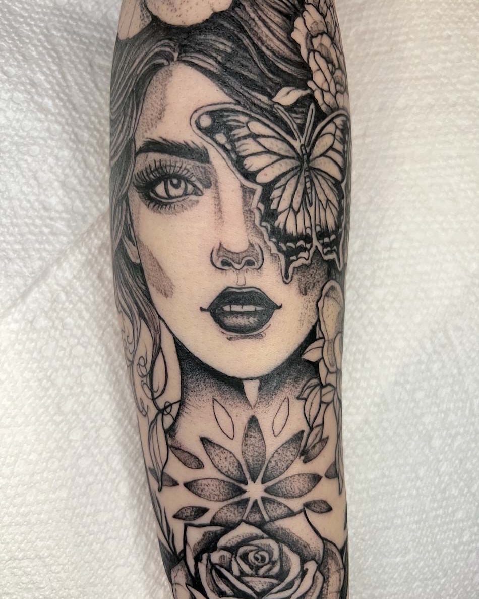 Woman's face dotwork tattoo on the forearm by amanda malia wega
