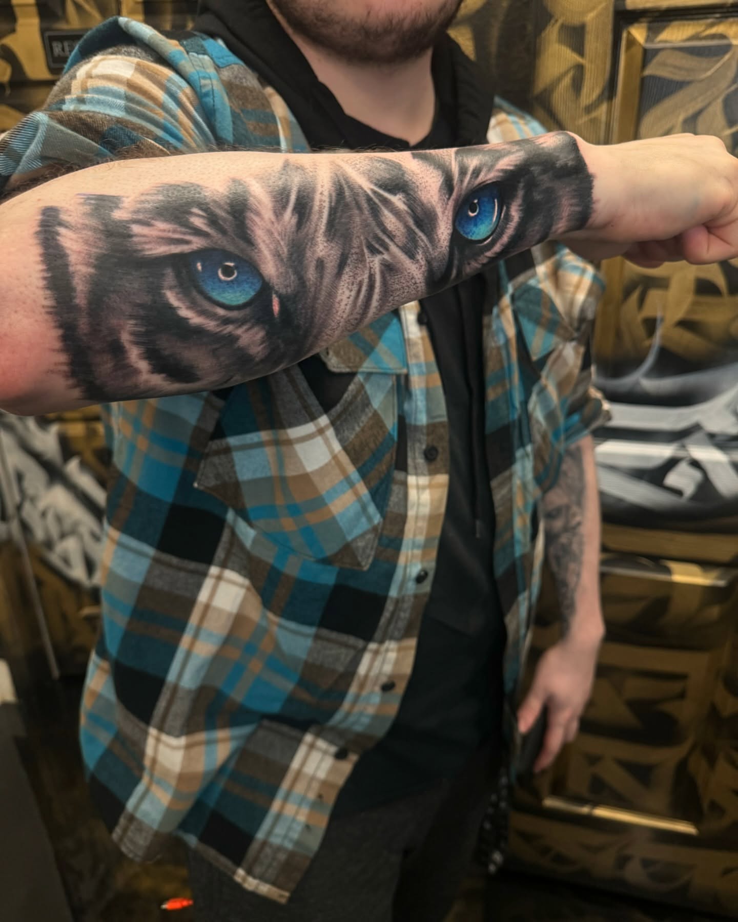 Cat realism tattoo on the forearm by Fernando Luna