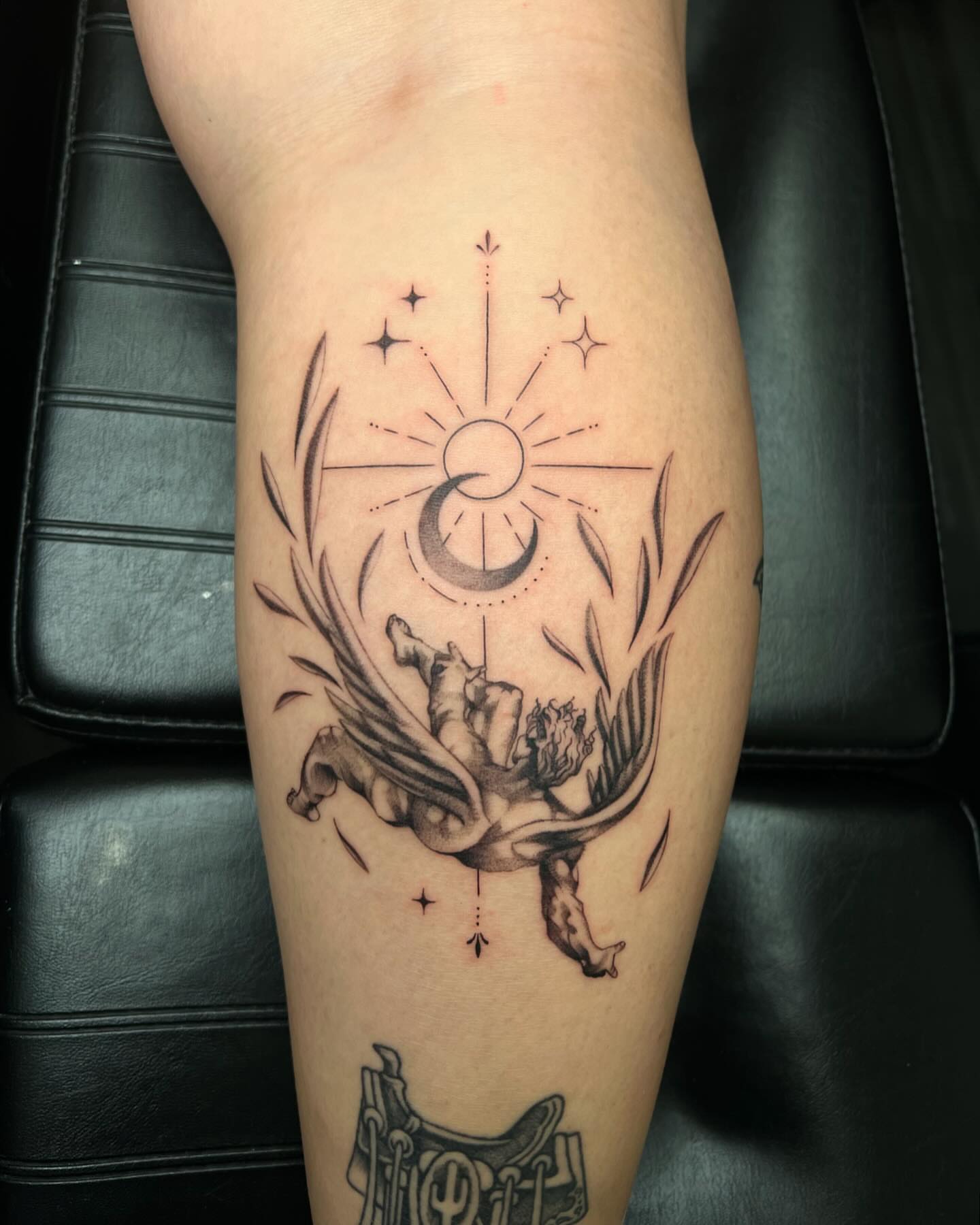 Mythical creature with wings black and grey tattoo on the thigh by San Diego Fineline Black & Grey Tattoo Artist