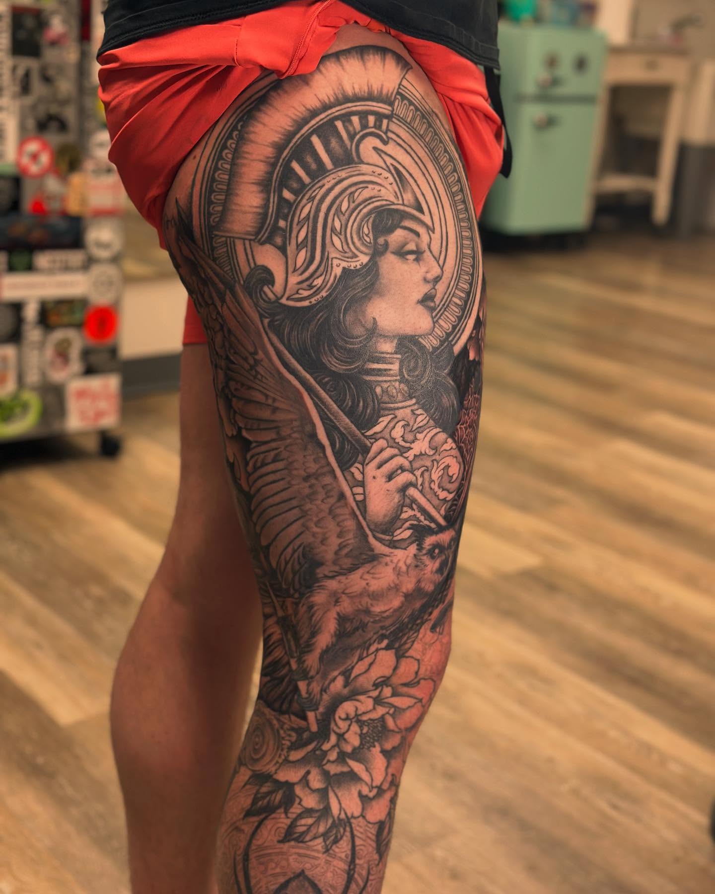 Woman with helmet American traditional tattoo on the thigh by Classy Fucking Lady Tattooer