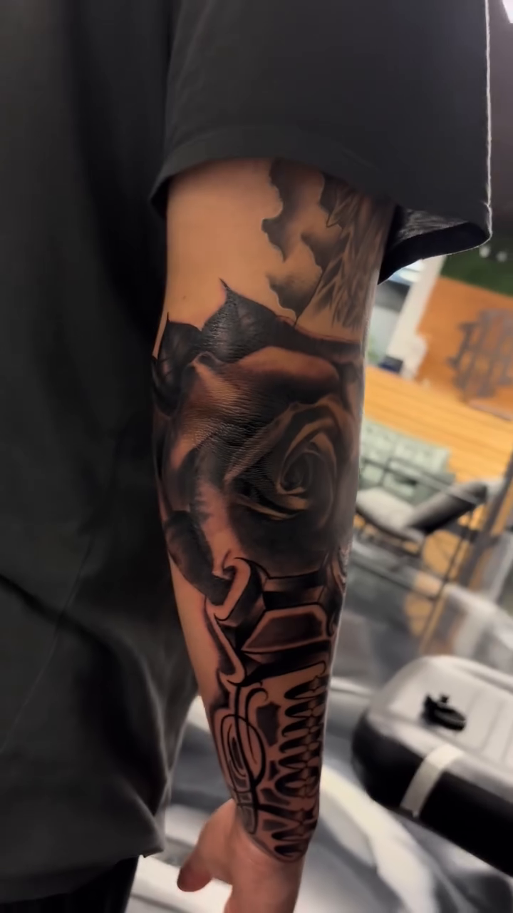 Rose and mechanical components realism tattoo by J.diaz🎖️