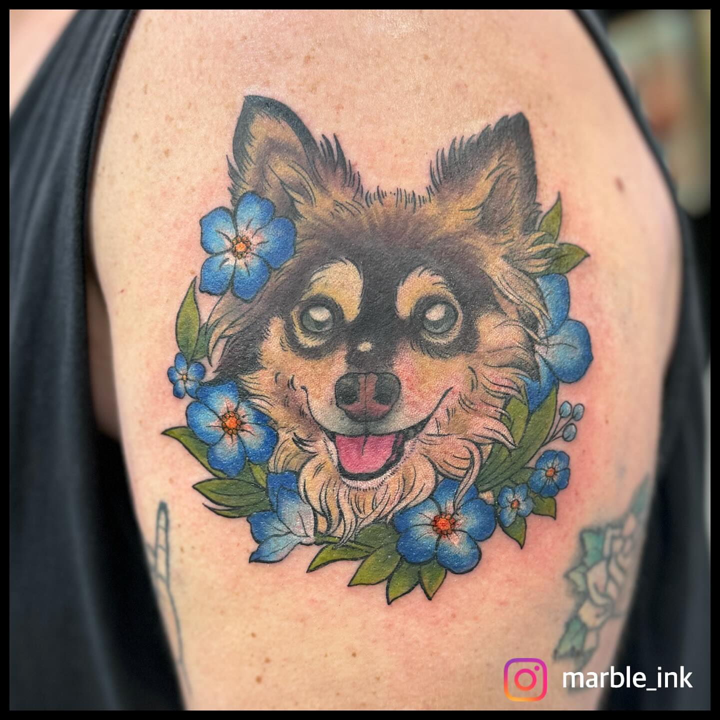 Chihuahua with flowers realism tattoo on the shoulder by Darbi "Marbles"