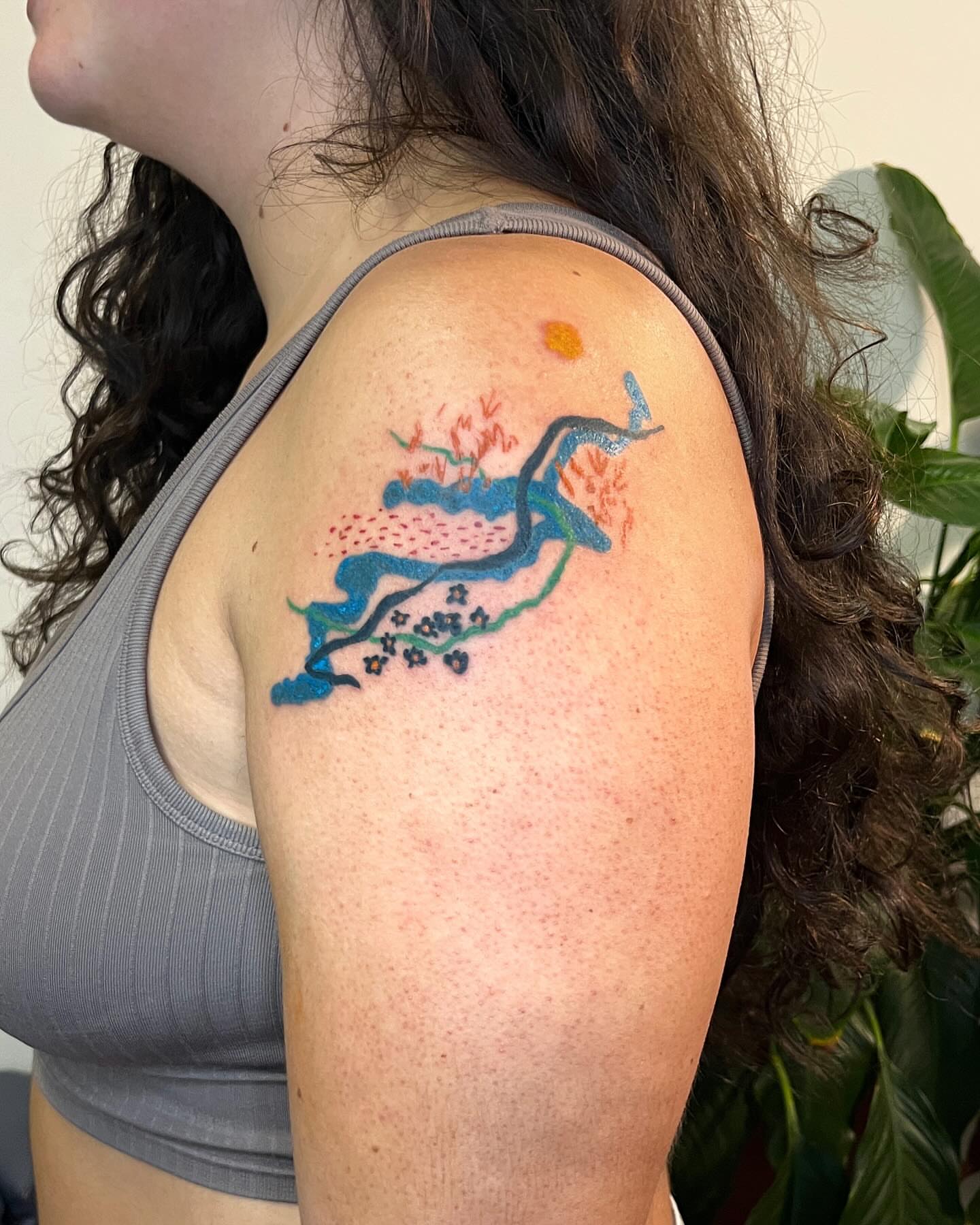 Branch with blossoms dotwork tattoo on the shoulder by tattoos by quin