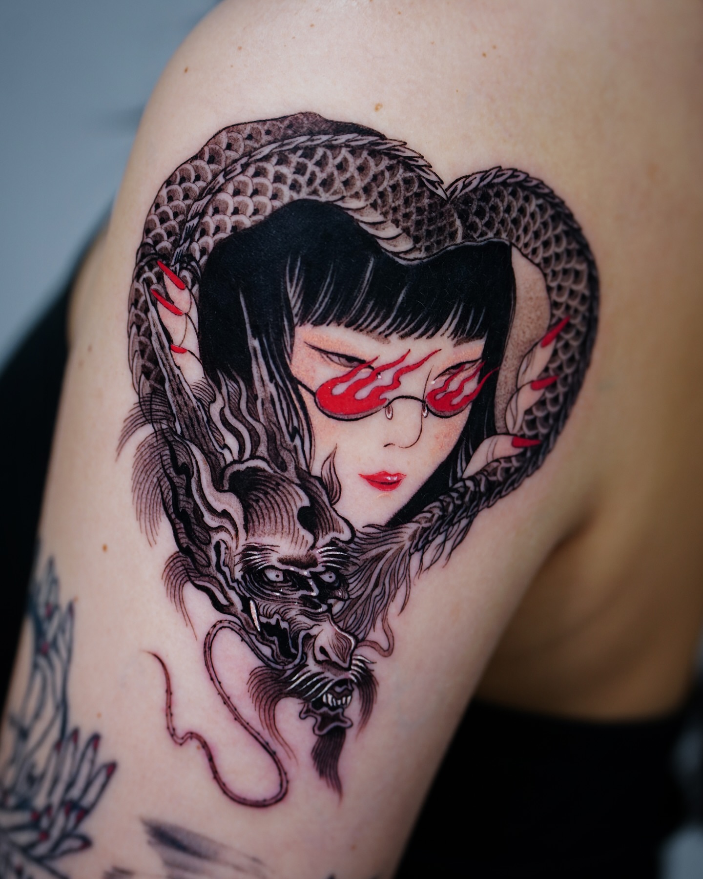 Woman with dragon japanese irezumi tattoo on the shoulder by Swani