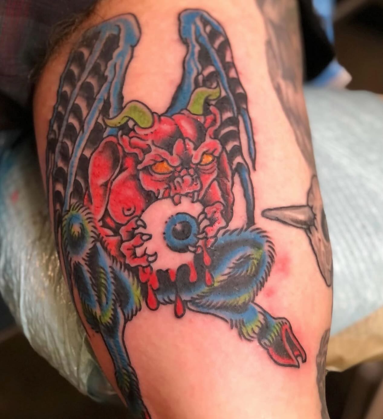 Demon skull American traditional tattoo on the forearm by Levi Cox, Powell, Ohio