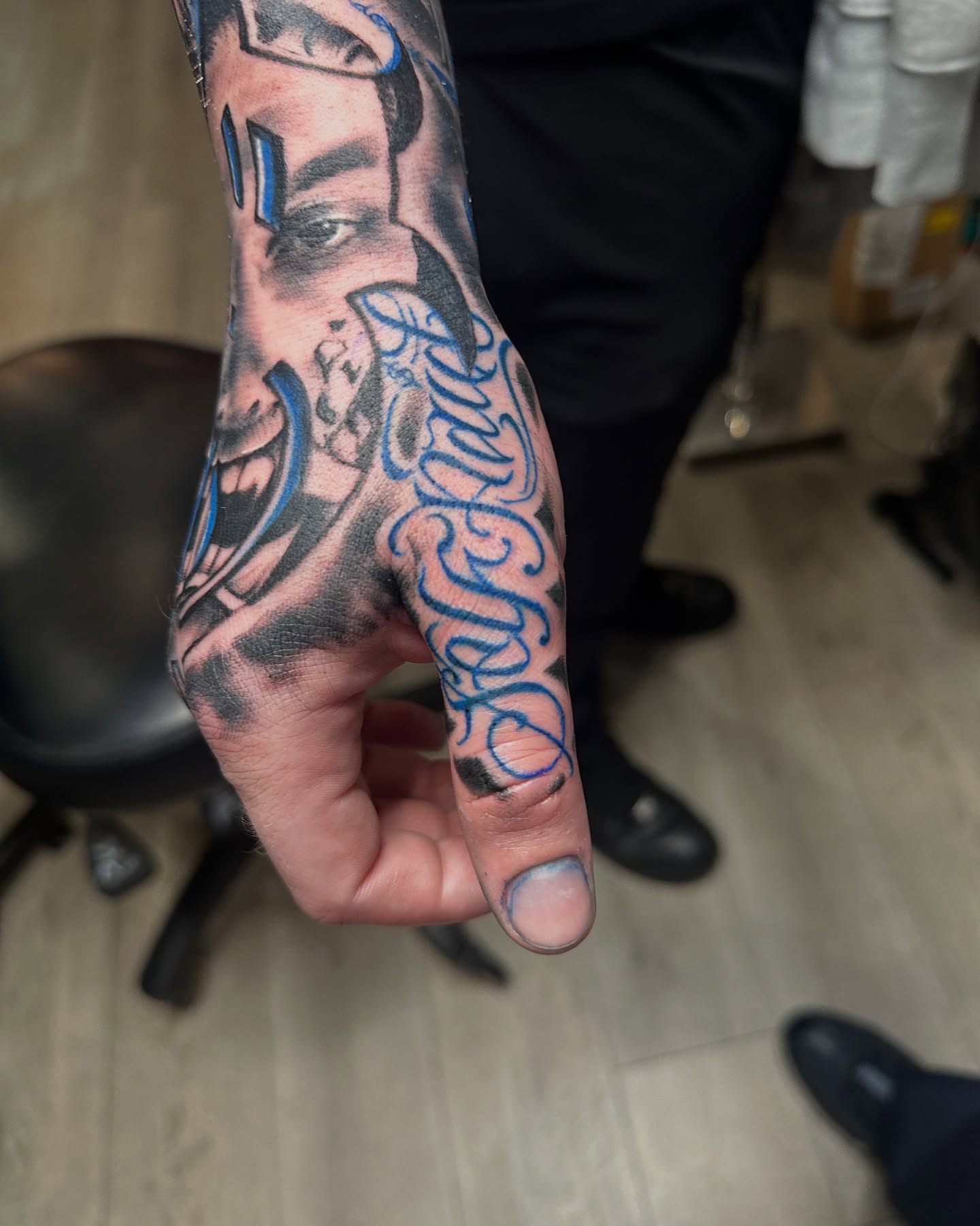 Portrait realism tattoo on the hand by WestHustleArt